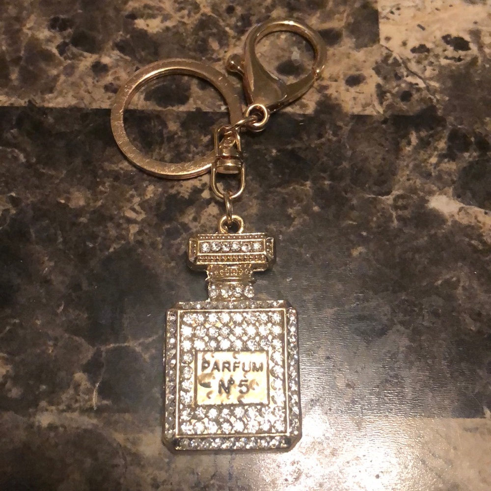Crystal studded perfume bottle keychain